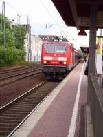 BR 143/16224/143-618-faehrt-mit-der-s8 143 618 fhrt mit der S8 Mnchengladbach in Dsseldorf-Vlklingerstrasse an.02.08.06
